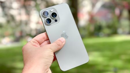 iPhone 15 Pro Max in hand 