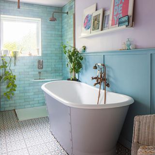 blue bathroom with freestanding bath