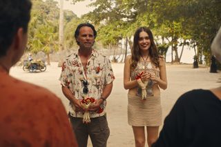 walton goggins and aimee lou wood as a couple arriving on vacation to the white lotus in season 3