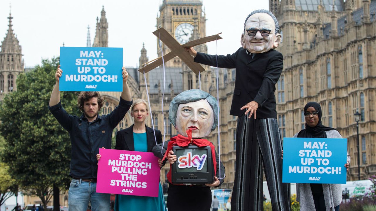 Protesters urge Theresa May to block Murdoch&amp;#039;s takeover of Sky