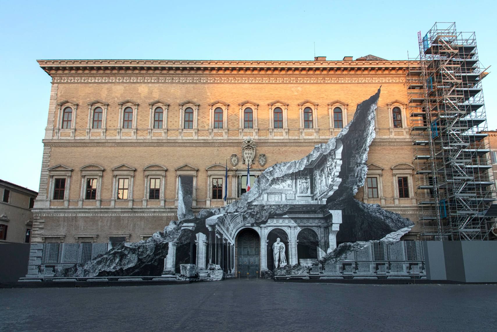 JR optical illusion street art on the wall of the Palazzo Farnese