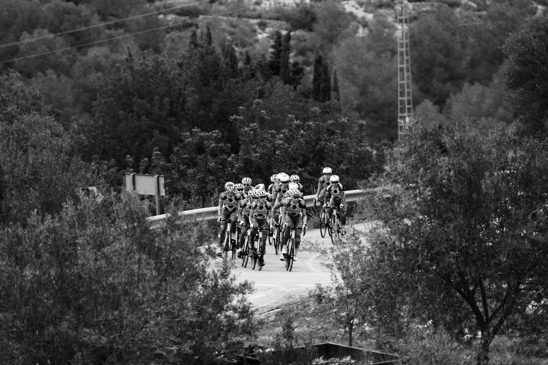 The team riders through the Spanish countryside