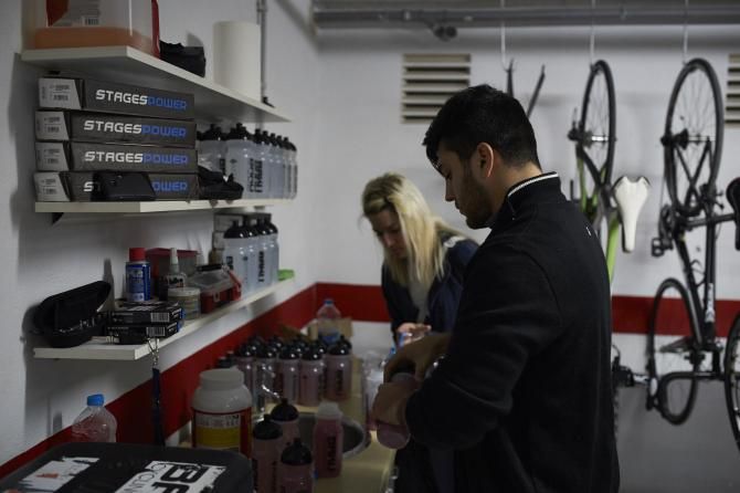 The soigneurs prepare the bidons ahead of the day's training ride.