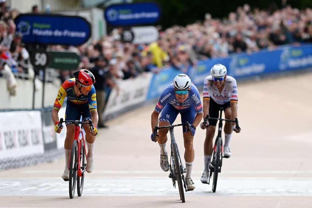 ROUBAIX FRANCE APRIL 07 LR Mads Pedersen of Denmark and Team Lidl Trek Nils Politt of Germany and UAE Team Emirates and Jasper Philipsen of Belgium and Team Alpecin Deceuninck sprint at finish line during the 121st ParisRoubaix 2024 a 2597km one day race from Compiegne to Roubaix UCIWT Roubaix Velodrome Velodrome Andre Petrieux on April 07 2024 in Roubaix France Photo by Dario BelingheriGetty Images