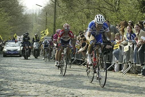 Spectators cheer the riders up the Bosberg