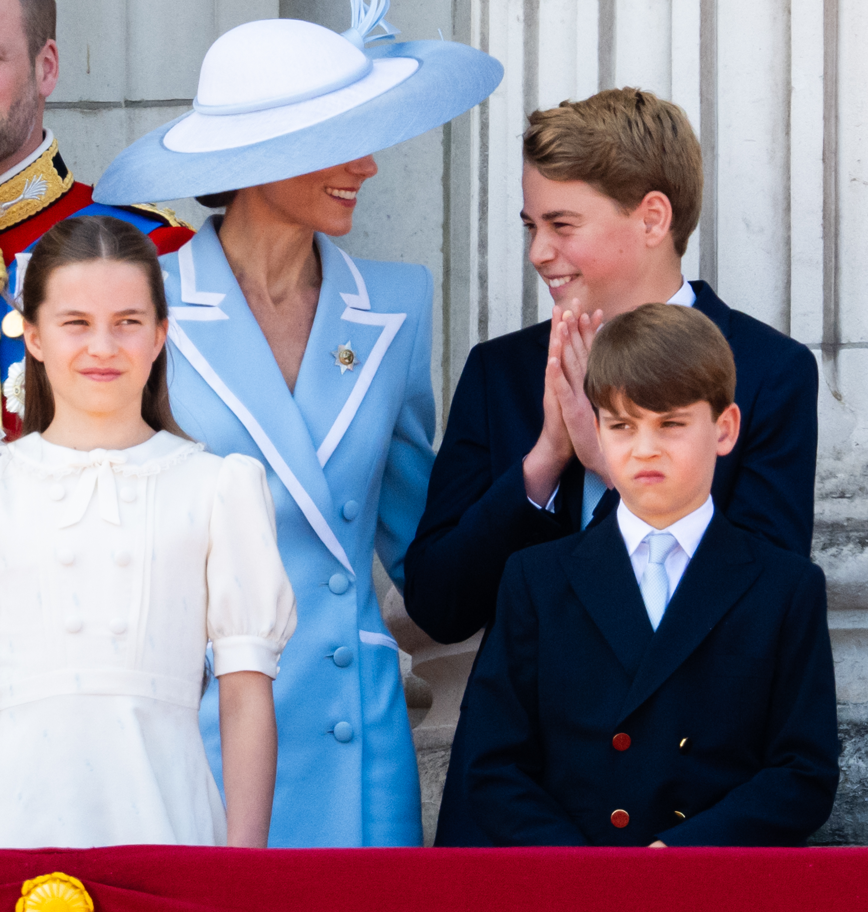 Prince George laughing with Princess Kate, Princess Charlotte and Prince Louis at Trooping the Colour 2026