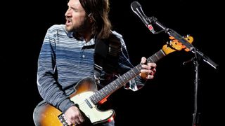 John Frusciante of Red Hot Chili Peppers performs during their Unlimited Love Tour at Marvel Stadium on February 7, 2023 in Melbourne, Australia. He is playing a Fender Telecaster Custom electic guitar.
