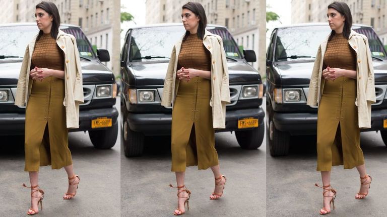 Clothing, Land vehicle, Brown, Vehicle, Automotive design, Car, Outerwear, Street fashion, Automotive exterior, Bag,