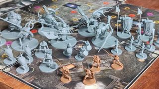 Dark Souls board game miniatures arrayed on the board