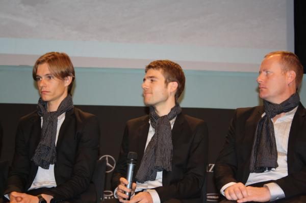 Maxime Monfort smiles on as the press ask questions