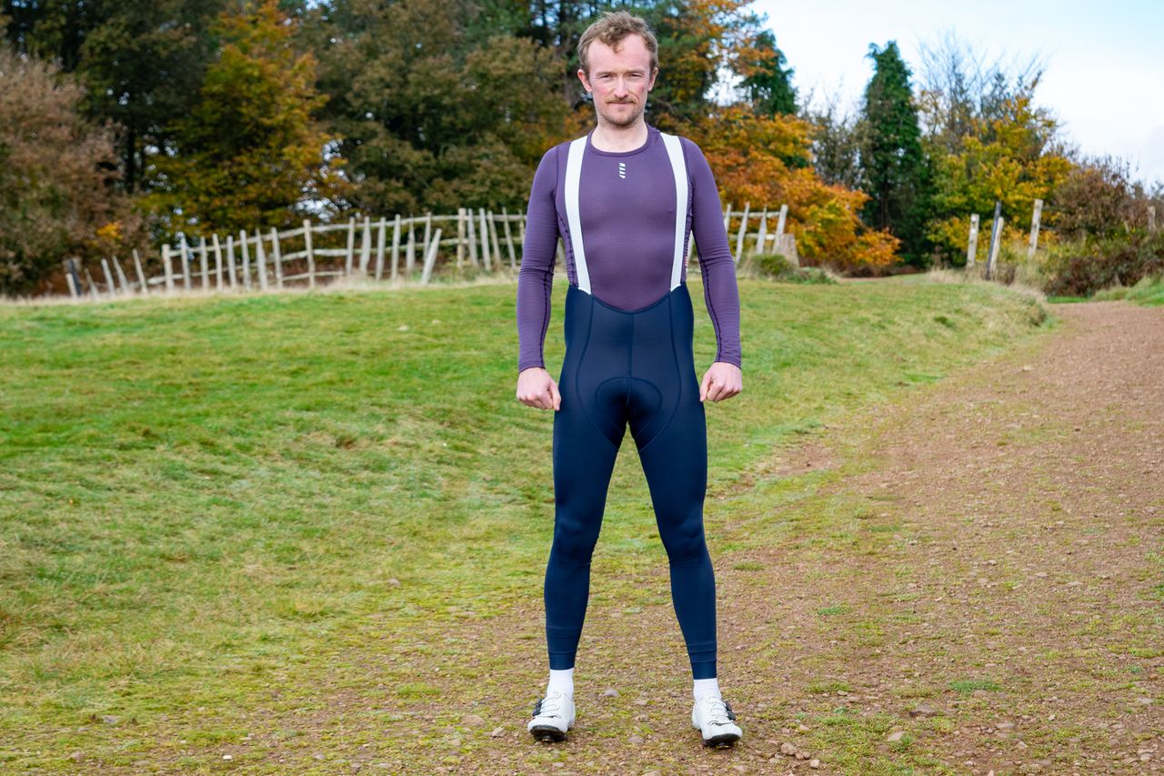 A man wearing a pair of Rapha Pro Team Lightweight bibtights