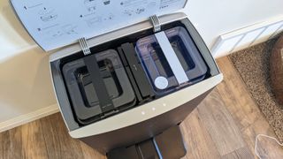 ECOVACS Deebot X1 OMNI lid open to see water tanks