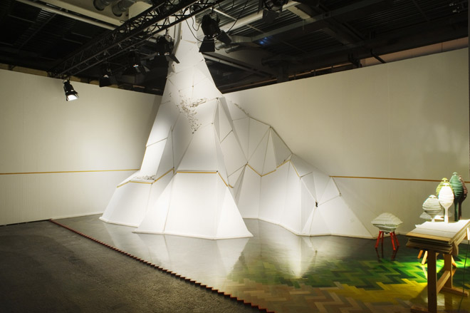 big white object on green and yellow floor