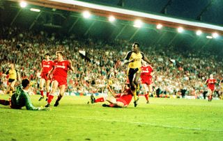 Michael Thomas of Arsenal scores the goal to seal the First Division title against Liverpool at Anfield, May 1989