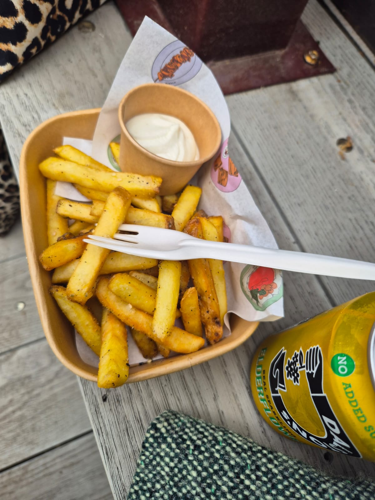 A picture of some delicious fries with Za'atar and toum (a lebanese garlic sauce)