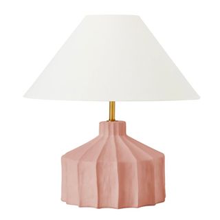 A ceramic pale pink table lamp with linen lampshade