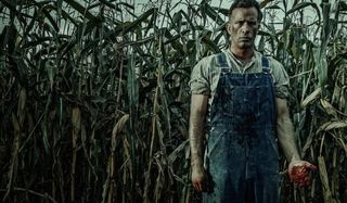 1922 Thomas Jane stands in the corn with bloodied hands