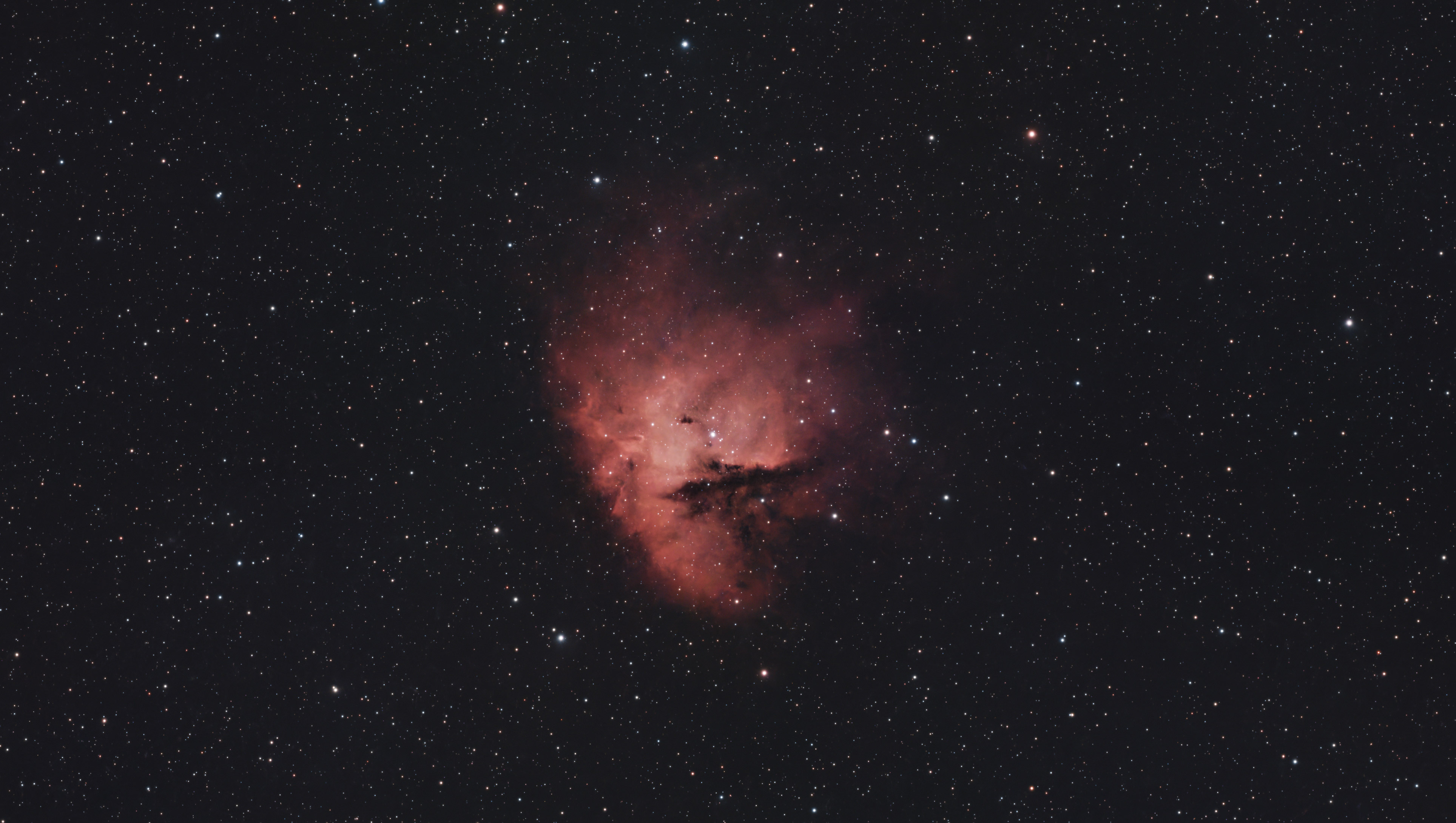 A photograph of the Pacman Nebula, taken with the Dwarf III smart telescope, processed in Pixinsight