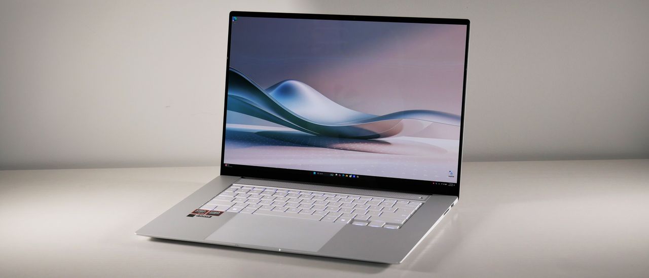 Asus Zenbook S16 UM5606 (Ryzen AI 9) angled on a white background with the display open.