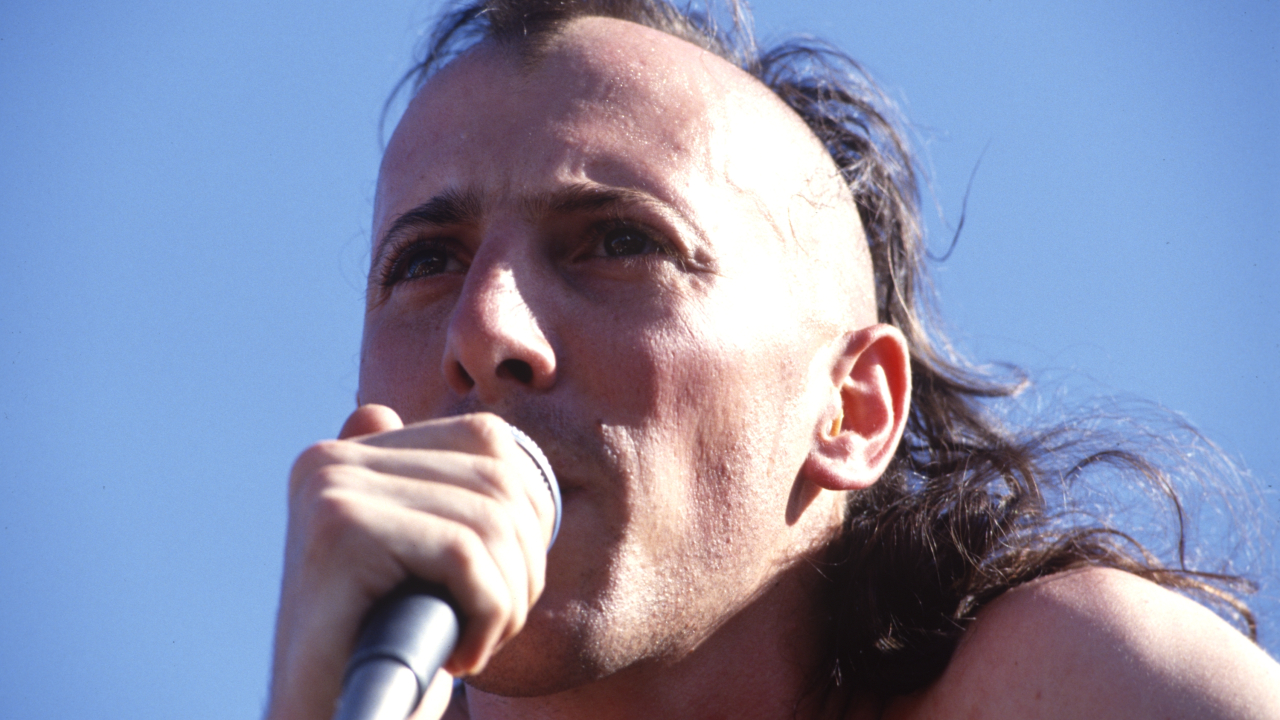 Maynard James Keenan singing onstage with Tool in 1993