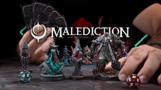 Malediction miniatures on a gray surface in front of dice, with a hand moving one whilst holding cards