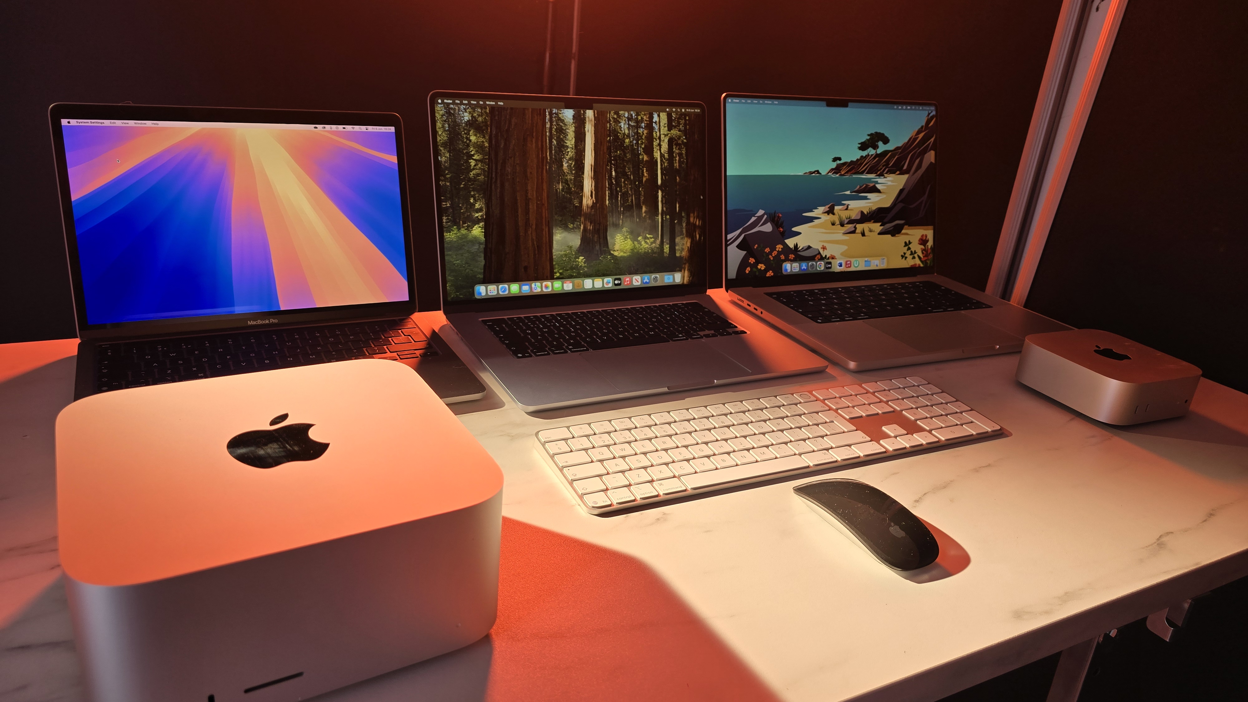 images of a MacBook Pro 13-inch, MacBook Pro 16-inch, MacBook Air 15-inch, Mac mini and Mac Studio in a photo studio