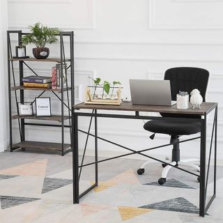 folding desk with laptop and cup of tea