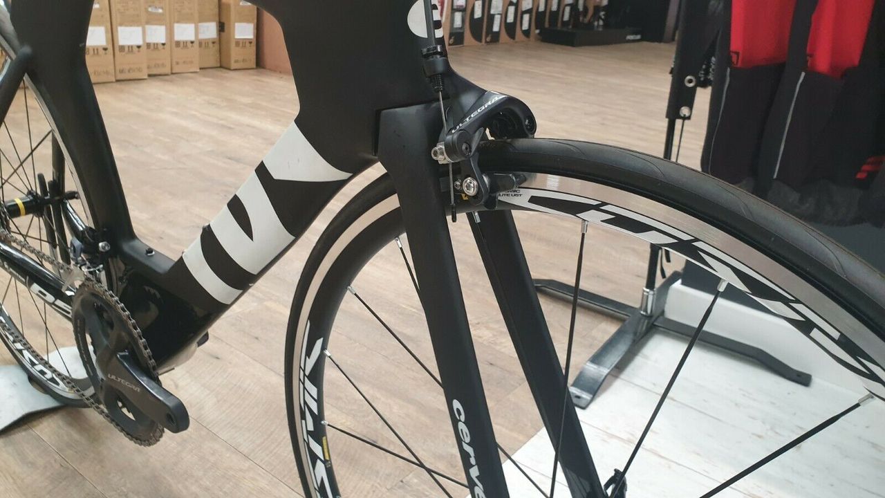 The front end of the bike, with Mavic wheels and an Ultegra brake
