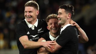 Will Jordan of New Zealand celebrates scoring his team's fifth try with Damian McKenzie of New Zealand and Jordie Barrett of New Zealand during the Nations Championship match between New Zealand All Blacks and Italy 