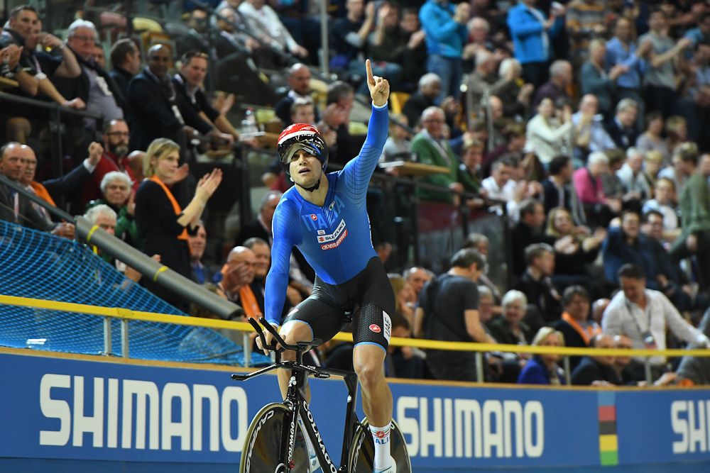 Italy's Filippo Ganna celebrates after the men's individual pursuit race final during the UCI Track Cycling World Championships