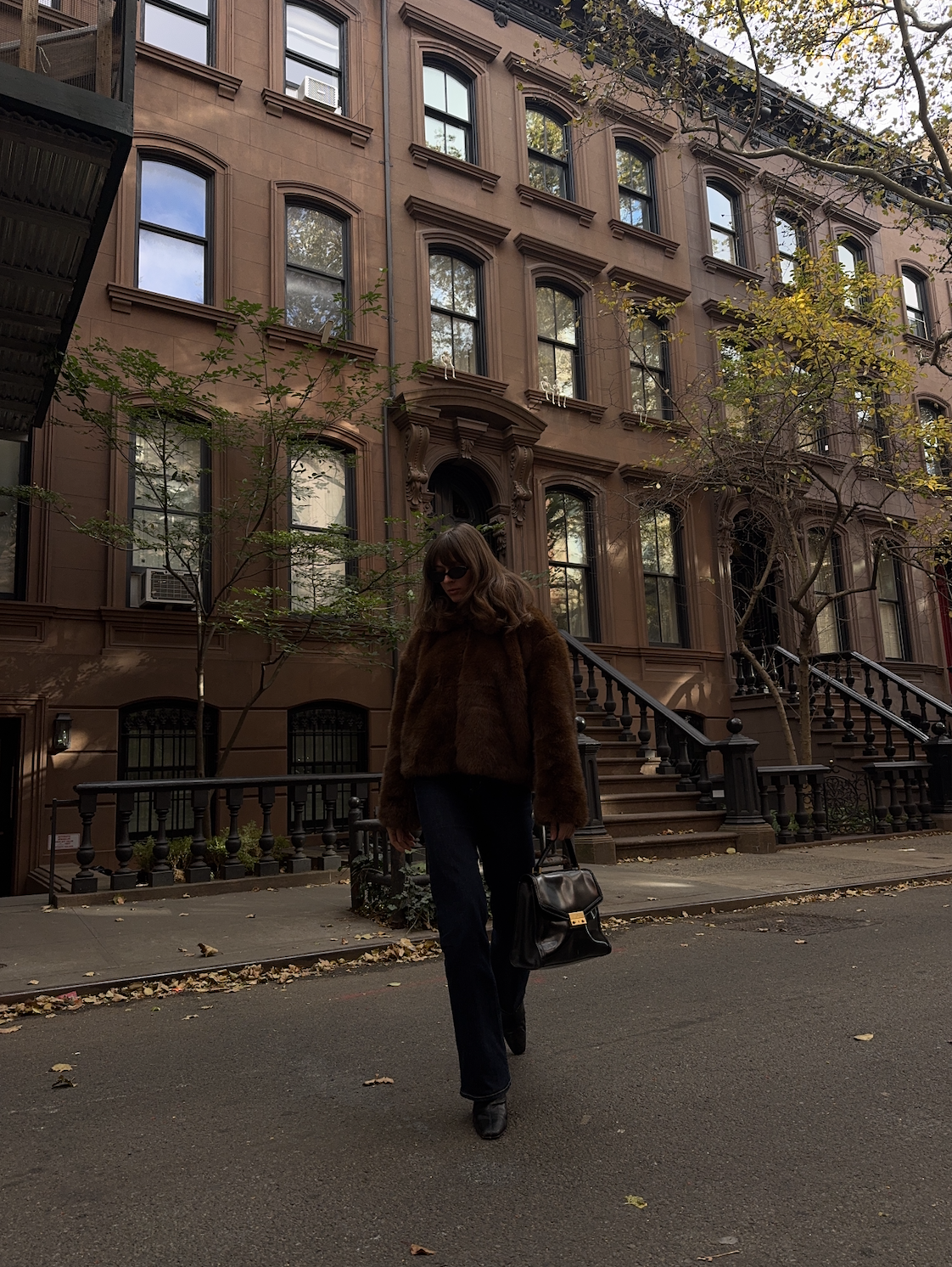 Kathryn Zahorak in front of west village apartment building in new york city