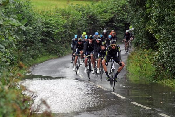 Ian Bibby (Endura Racing) with some intereresting body english as he rides through a puddle.