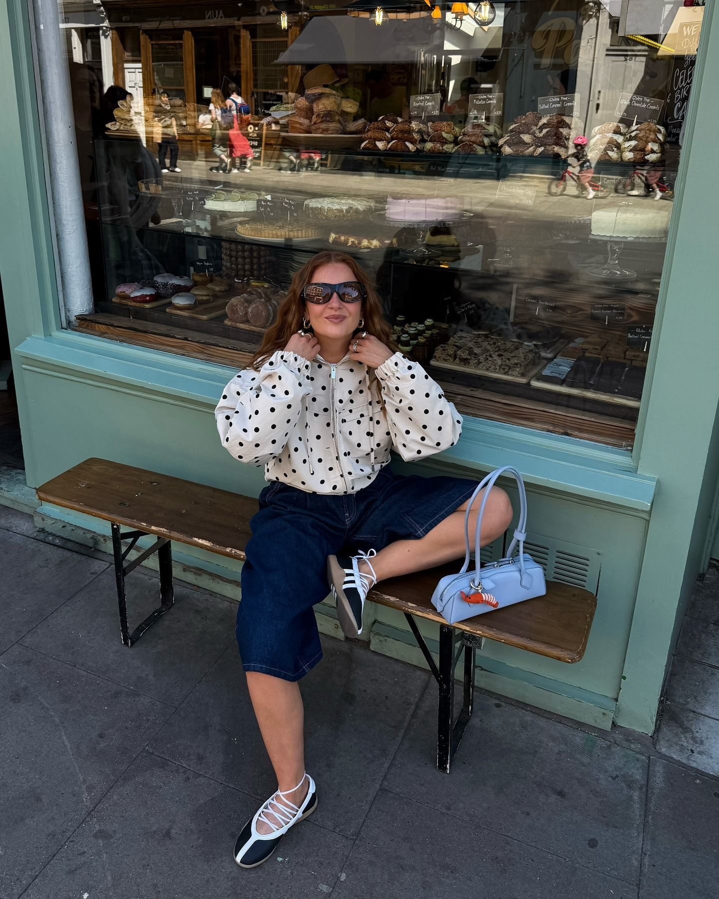 Fashion person Rebecca Ferraz-Wyatt swaps her dated trainers trends winter 2025 for trendier pairs. She wears sneakerina's in a recent image from her Instagram.