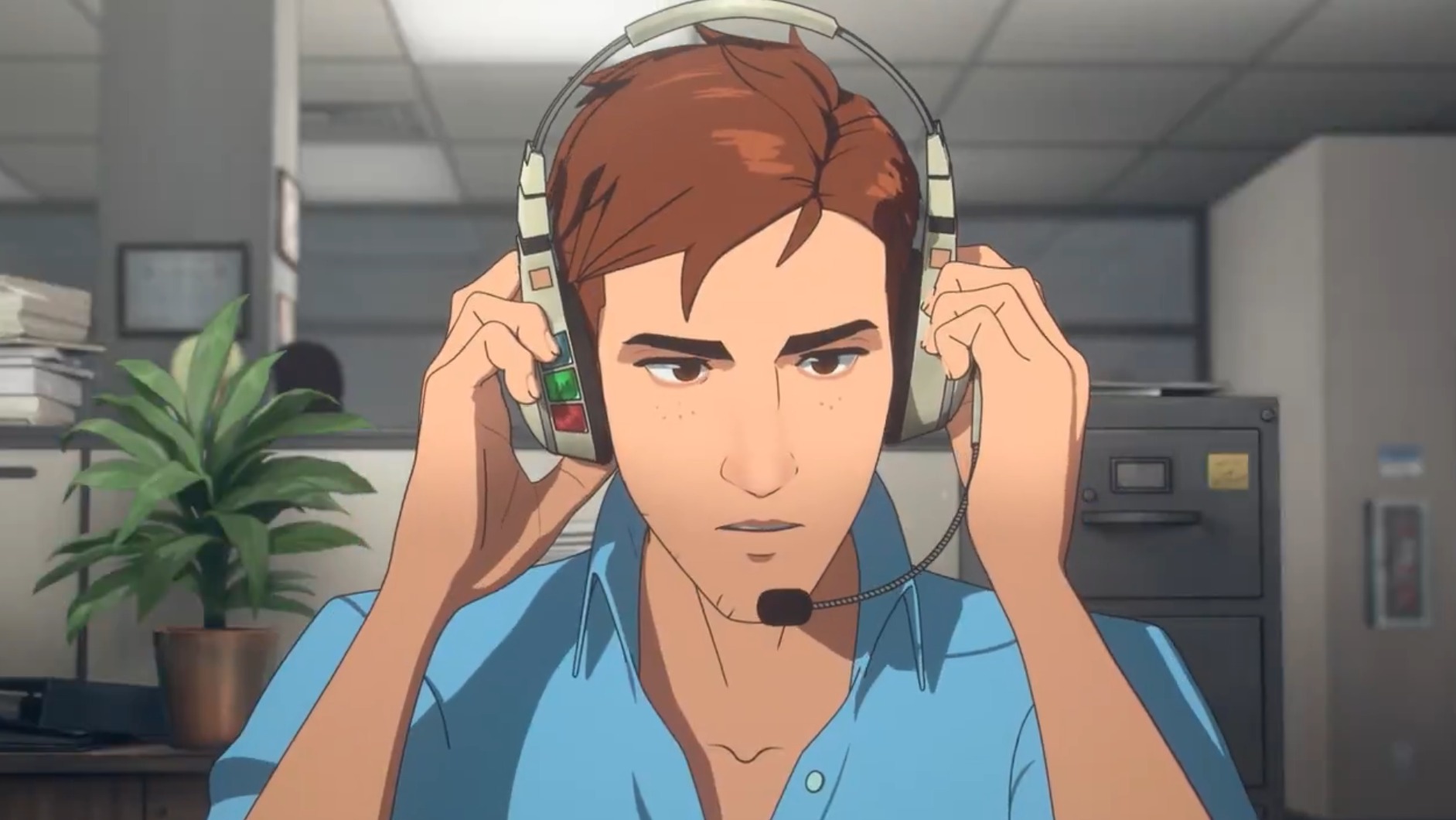 An office worker putting on a pair of headphones while getting ready to work a full day in an office building.
