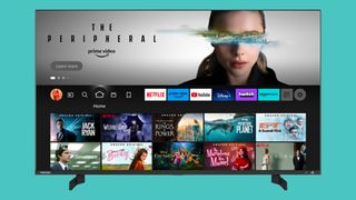 The Toshiba QF5D TV on a blue background with Prime Video on the screen