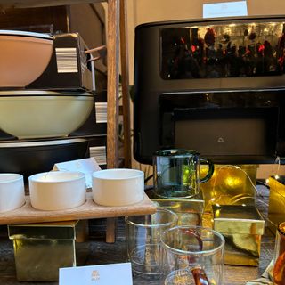 Black air fryer on a kitchenware display