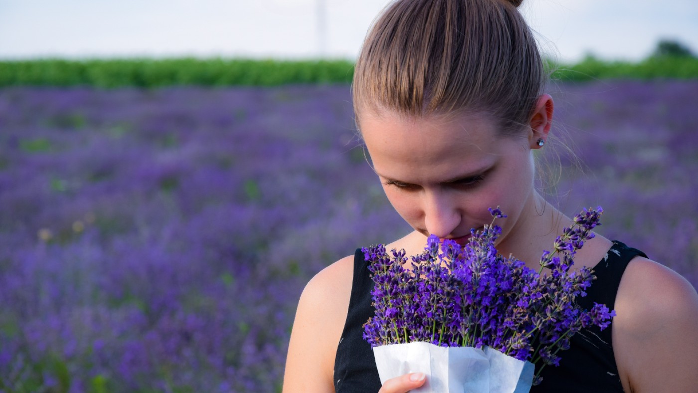 Woman smelling lavender