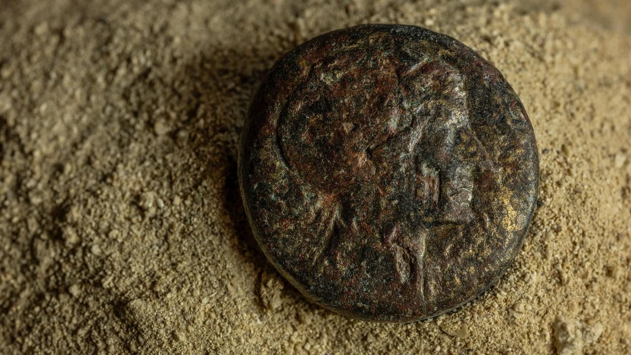 a coin with a face on it