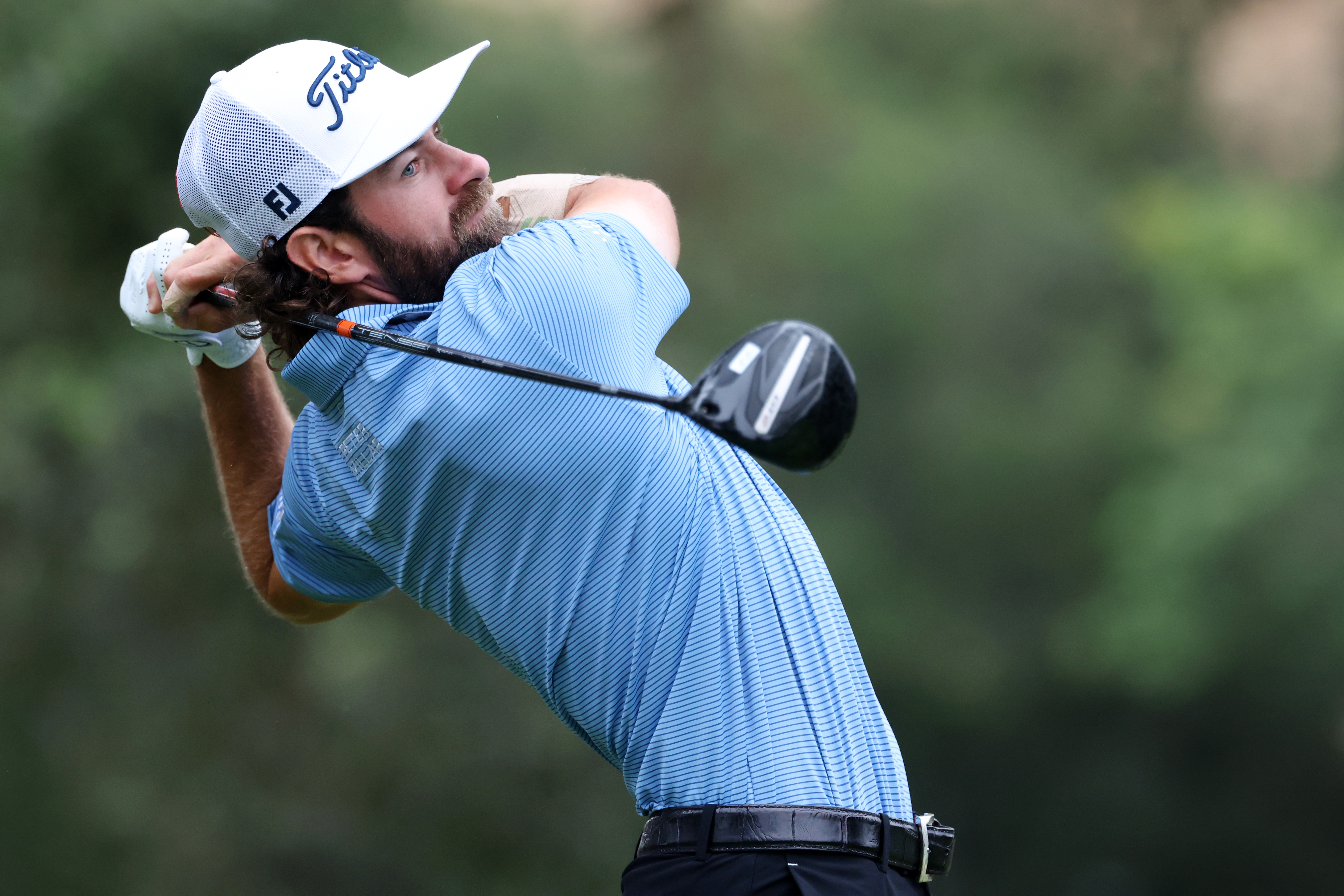 Cameron Young hits a driver off the tee