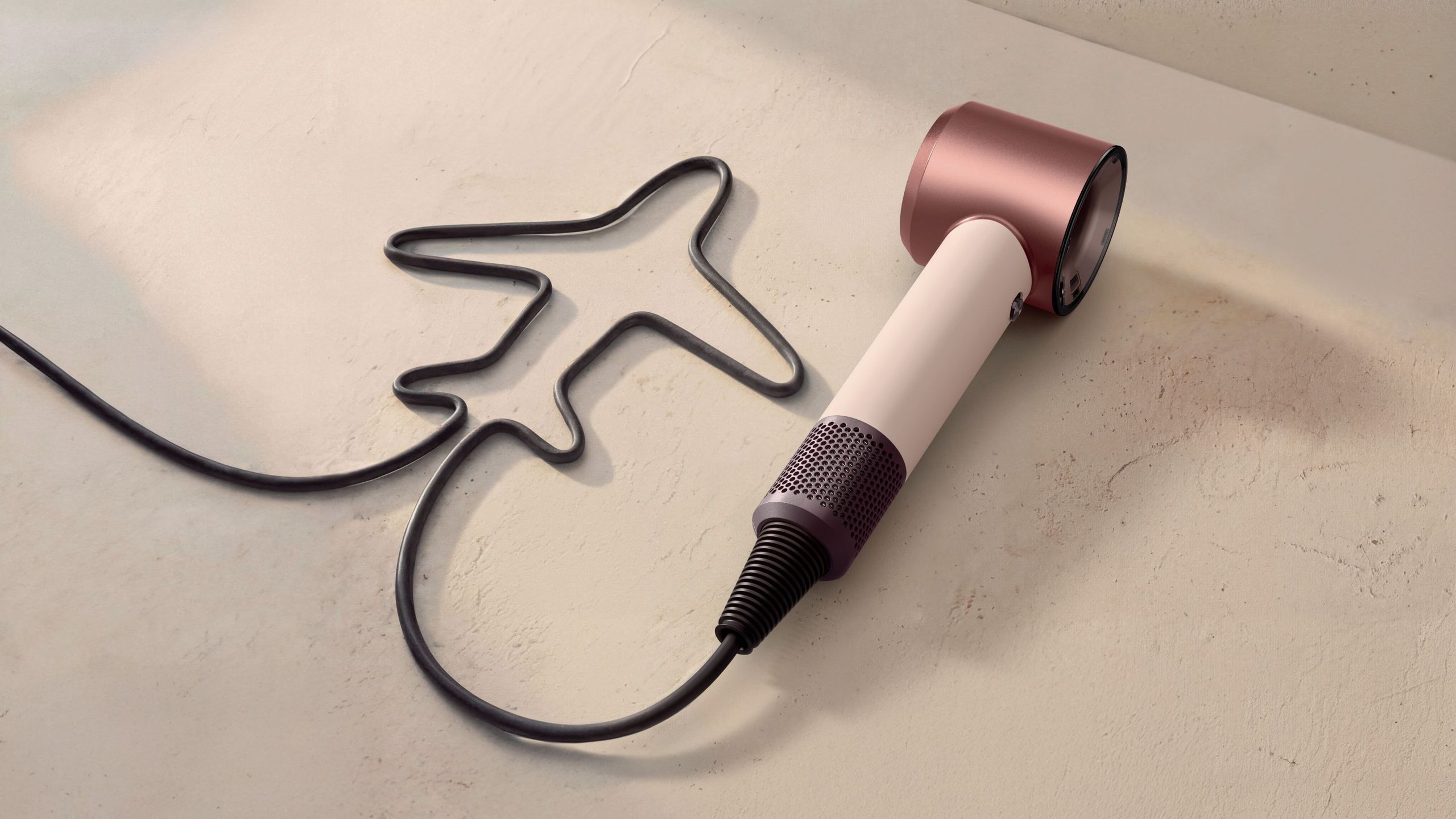 Going on vacation? Leave space in your suitcase for Dyson's new travel-size Supersonic hairdryer