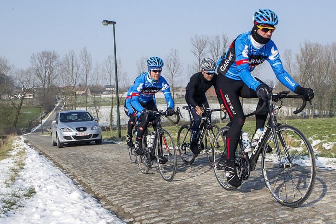 Garmin-Sharp's Martijn Maaskant and Tyler Farrar are joined by former teammate Heinrich Haussler (IAM Cycling) to recon the Haaghoek pave sector.