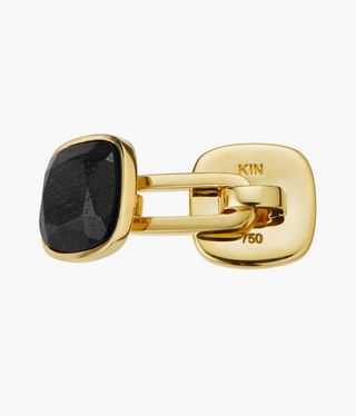 Gold cufflinks with a black stone
