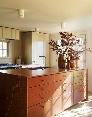 Workstead kitchen design with waterfall countertop