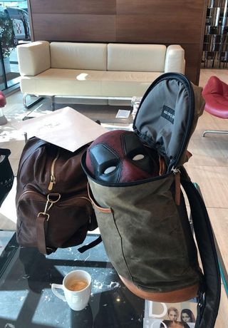 Ryan Reynolds' Instagram post, with Deadpool's mask coming out of his bag