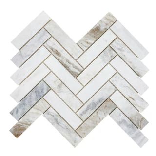 White veined marble tile in a herringbone pattern