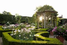 Seend Manor doesn't neglect England, with a quadrant designed by Julian and Isabel Bannerman, planted with roses, lilies, scented geraniums and peonies. Photo: ©Britt Willoughby Dyer