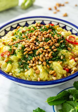 dish of Palestinian food topped with pine nuts