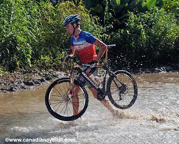 Thomas Dietsch demonstrates some of the hike-a-bike on the first day.