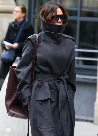 Victoria Beckham with burgundy bag