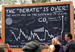 A group of scientists joined the "The Debate Is Over" themed section of the climate change march.